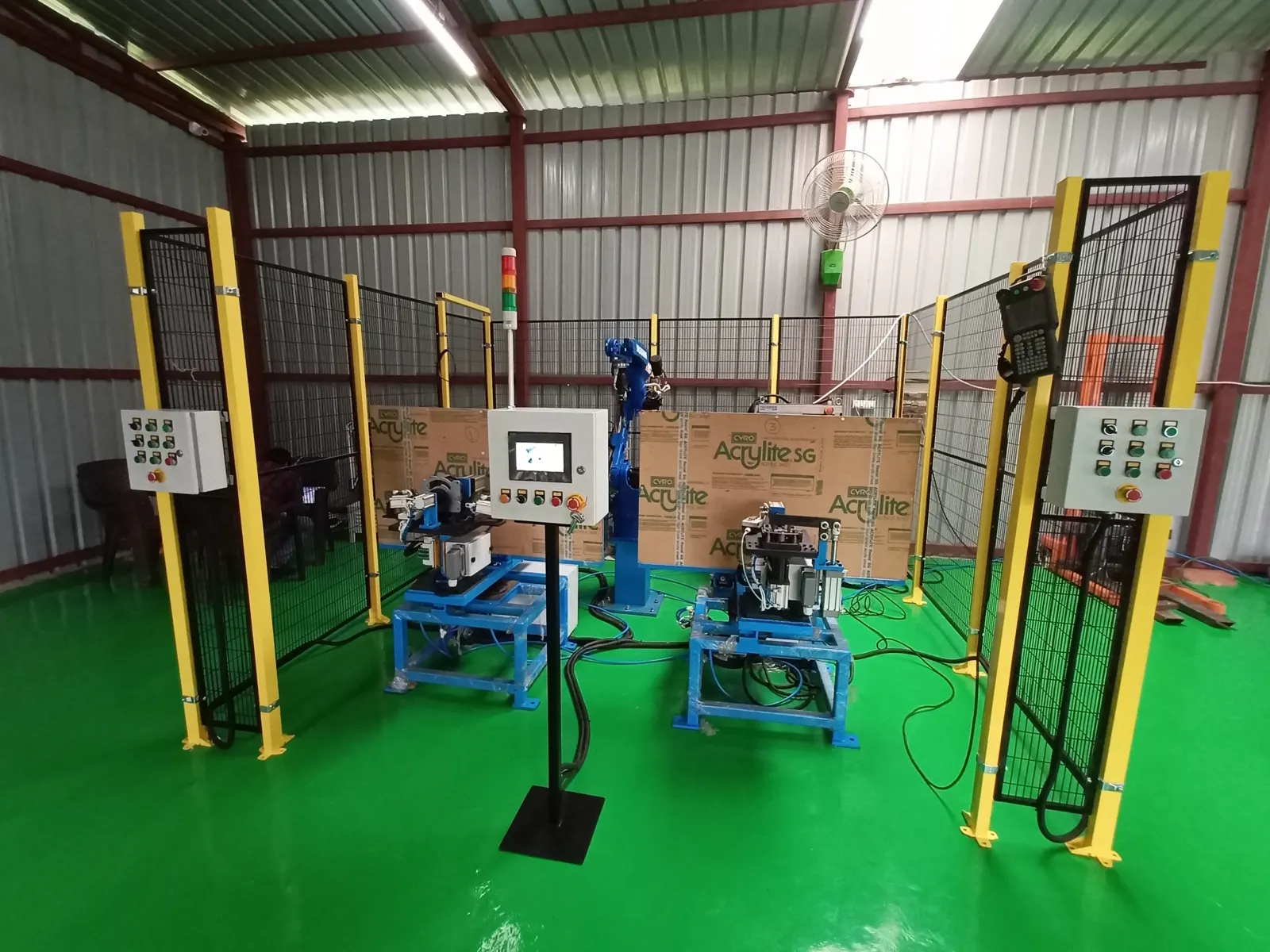 Welding robot reaching a fixtured breaker component